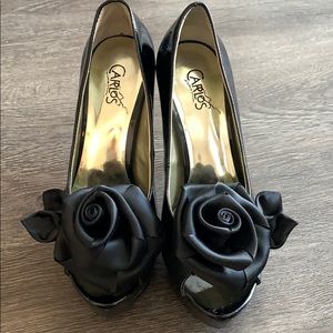 Carlos Santana heels with a black satin rose.